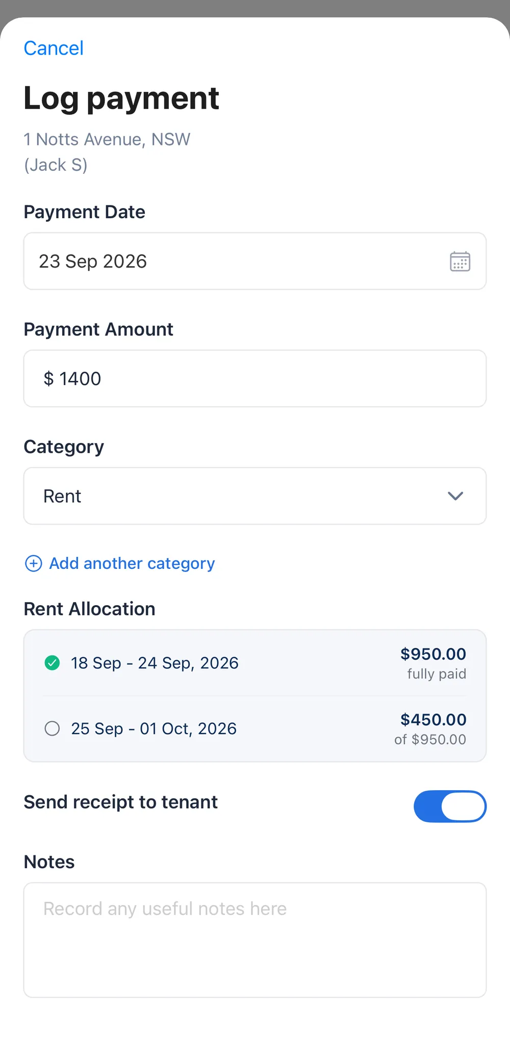 Rentiuno log payment screen splitting $1,400 across two rent periods before saving